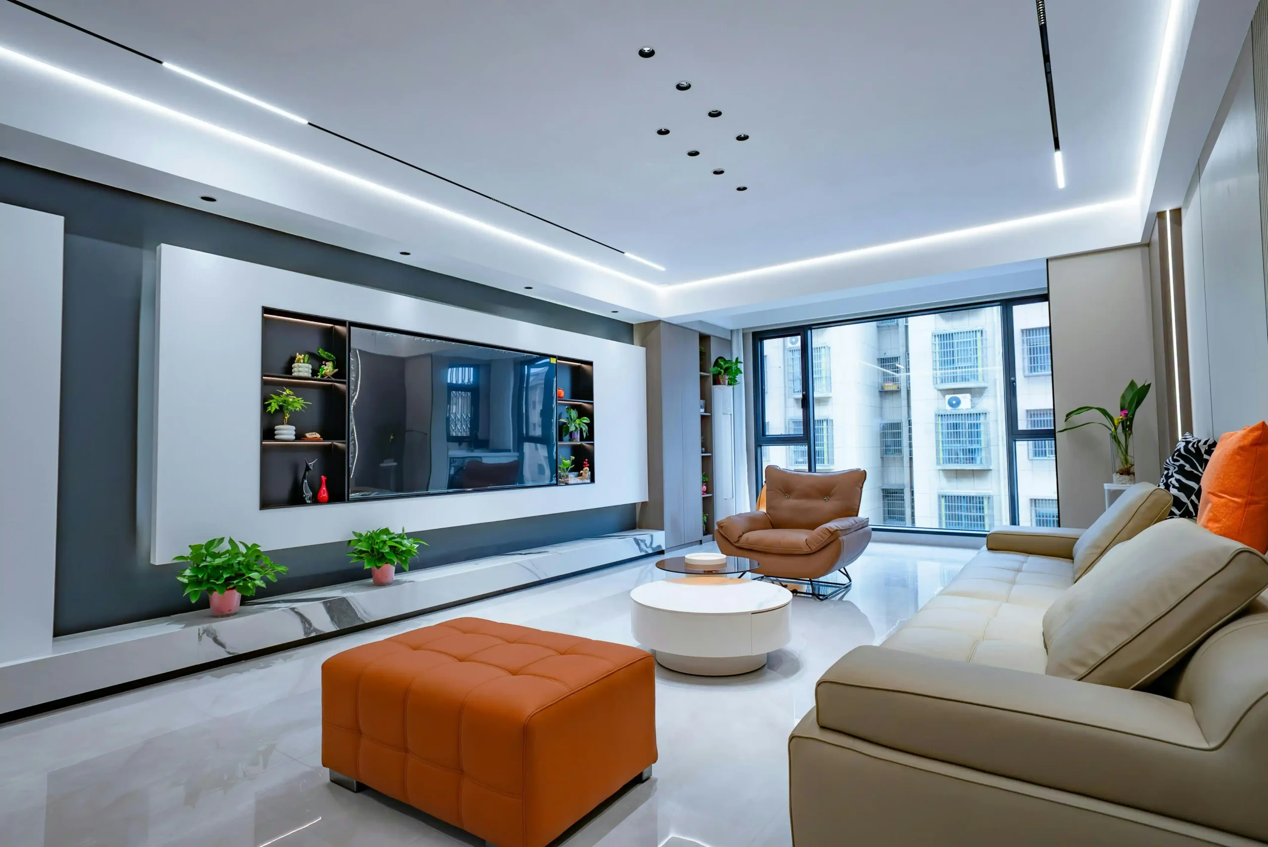 sleek interior of a custom-built living room with recessed smart lighting, wall-mounted touchscreen control panel, motorized shades partially lowered, and a modern fireplace in ...