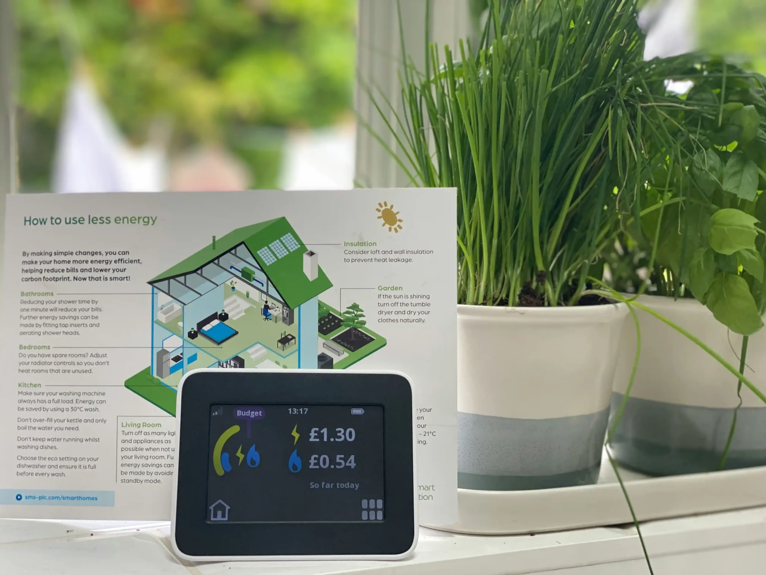 custom home utility room with organized smart electrical panel, battery backup system, EV charger interface, and tablet displaying real-time home energy usage charts