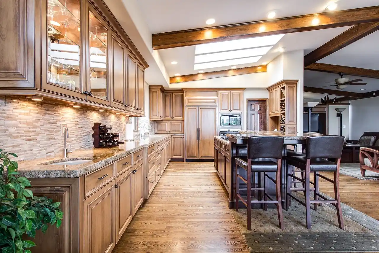 elegant finished custom home interior with white oak floors, matte black fixtures, custom cabinetry, soft natural light, and a contractor reviewing a punch list on a tablet