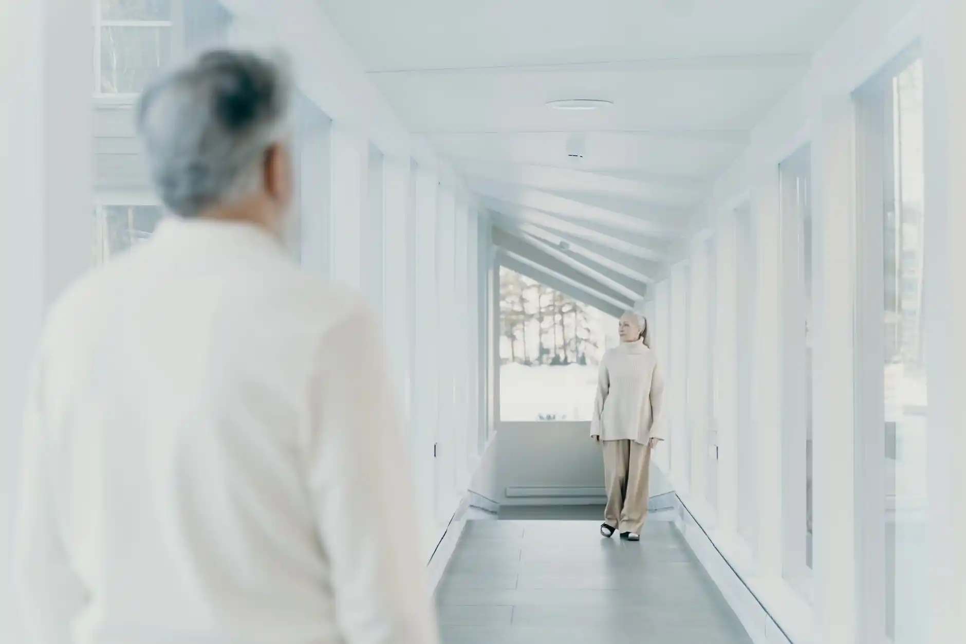 Editorial photograph illustrating "Start With the Path Through the House" in the context of aging in place remodeling, natural daylight, realistic setting, no text or logos in f...
