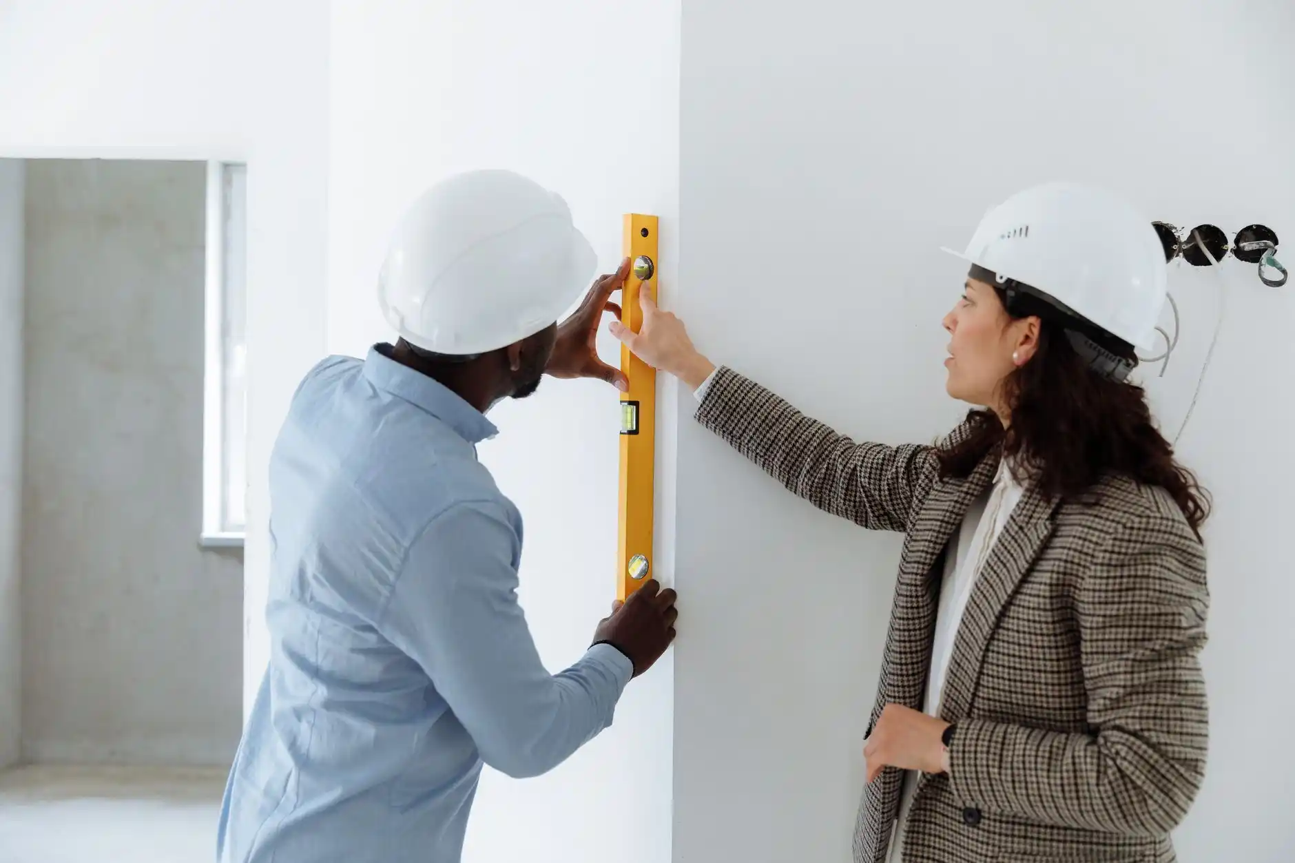 Editorial photograph illustrating "Step 6: Check Permit Implications" in the context of hidden damage during remodel, natural daylight, realistic setting, no text or logos in fr...