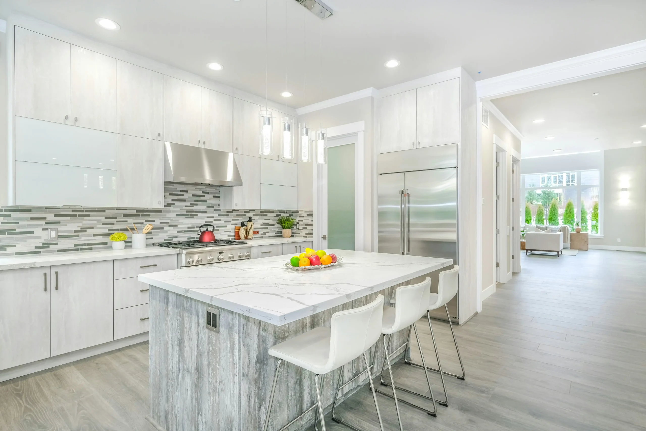 Organized kitchen remodeling process board displaying architectural plans, cabinet samples, quartz and tile swatches, plumbing fixtures, project schedule, and tablet with constr...