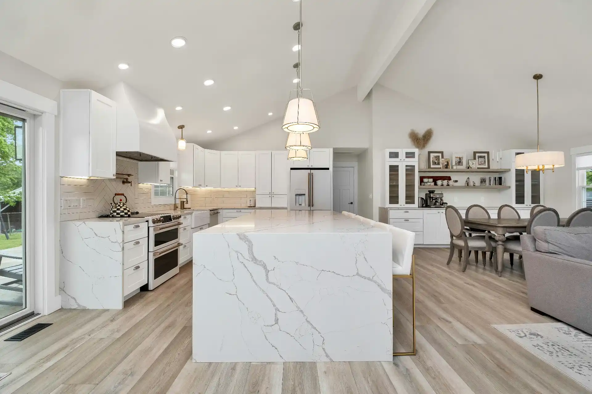 Editorial photograph illustrating "How Deep Should the Island Be" in the context of kitchen island size guide, natural daylight, realistic setting, no text or logos in frame.