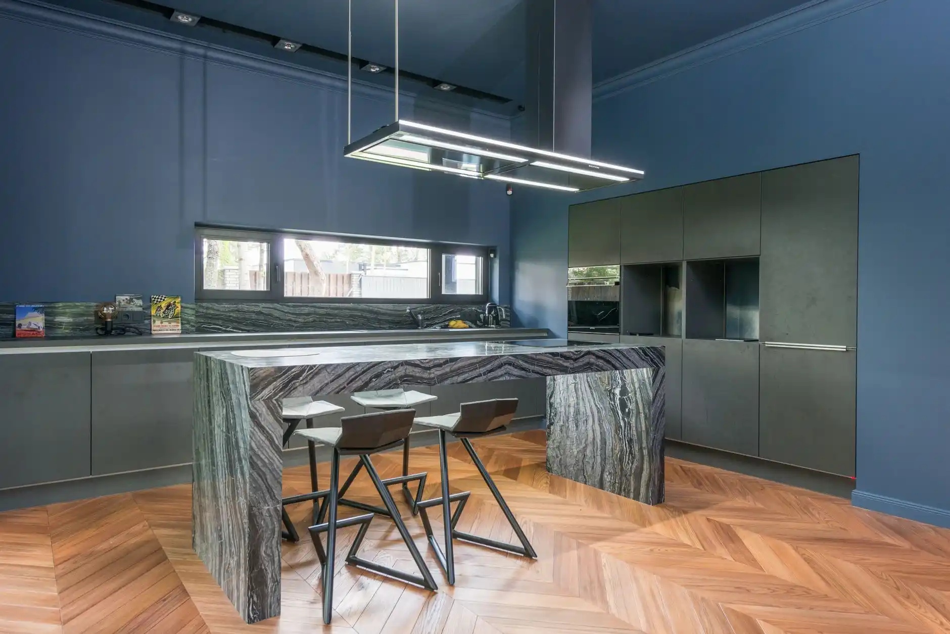 Editorial photograph illustrating "What About Electrical Outlets" in the context of kitchen island size guide, natural daylight, realistic setting, no text or logos in frame.