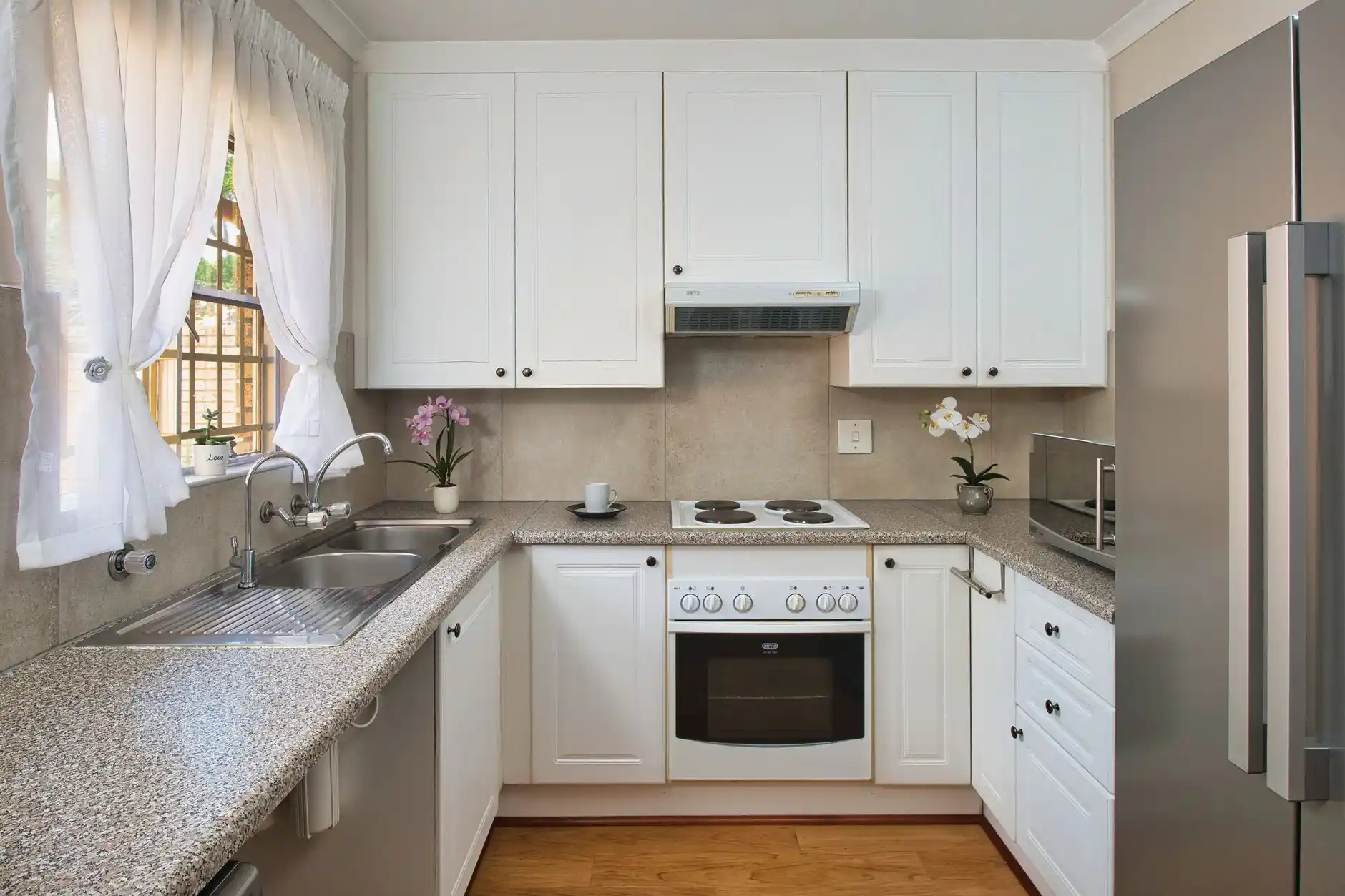 Editorial photograph illustrating "Which Layout Is Cheapest to Remodel" in the context of kitchen layout guide, natural daylight, realistic setting, no text or logos in frame.