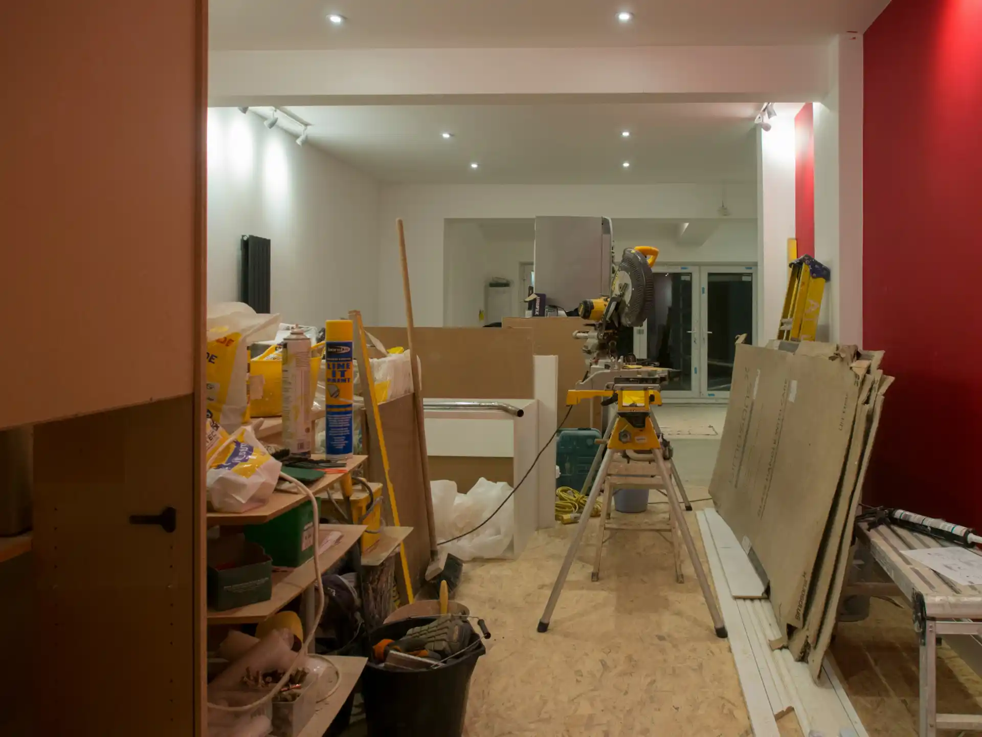 Editorial photograph illustrating "Occupied Projects Can Take Longer" in the context of live in house during remodel, natural daylight, realistic setting, no text or logos in fr...