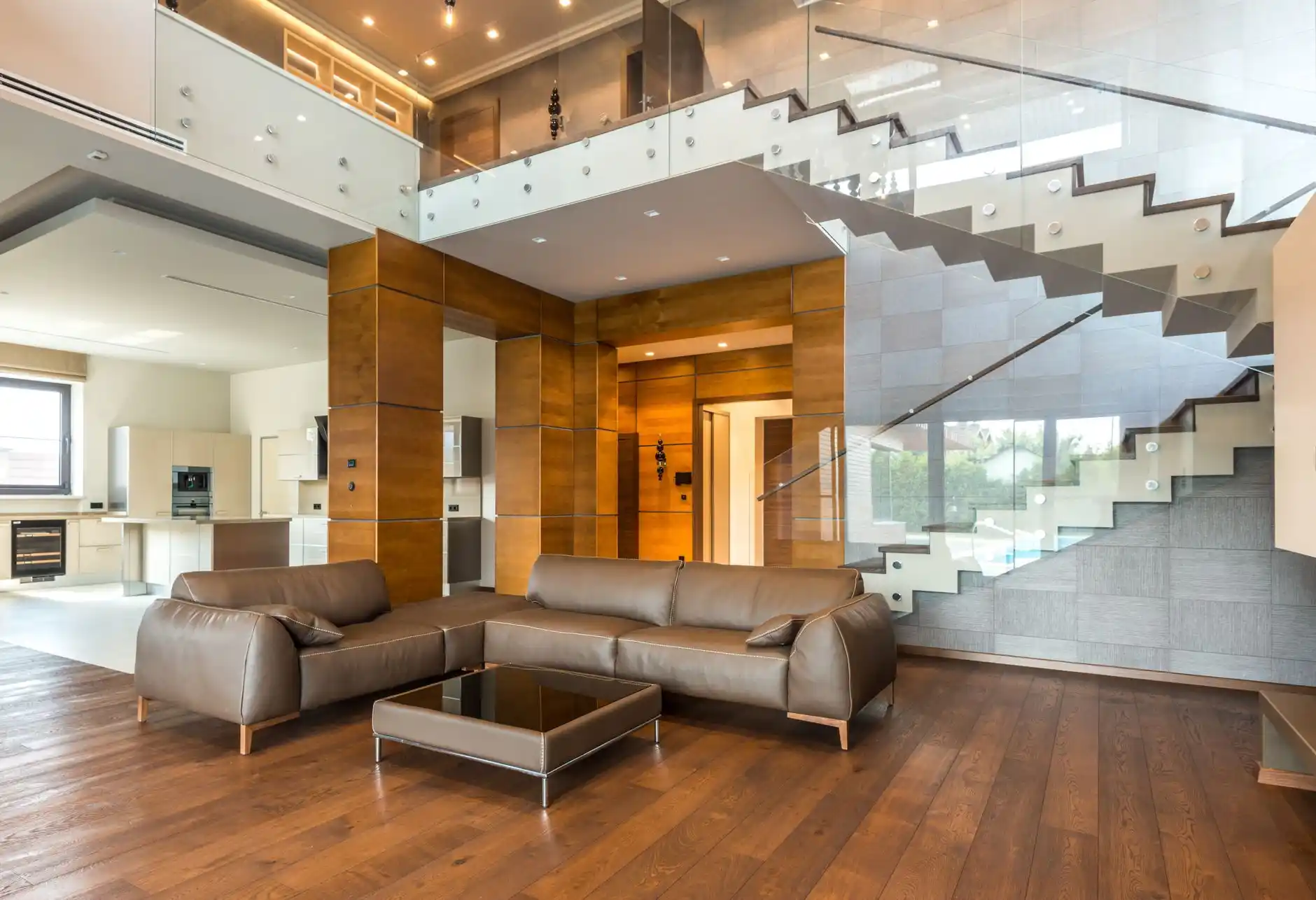 Sophisticated luxury whole-home interior with balanced proportions, custom white oak millwork, natural stone, concealed lighting, and restrained neutral furnishings, photographe...