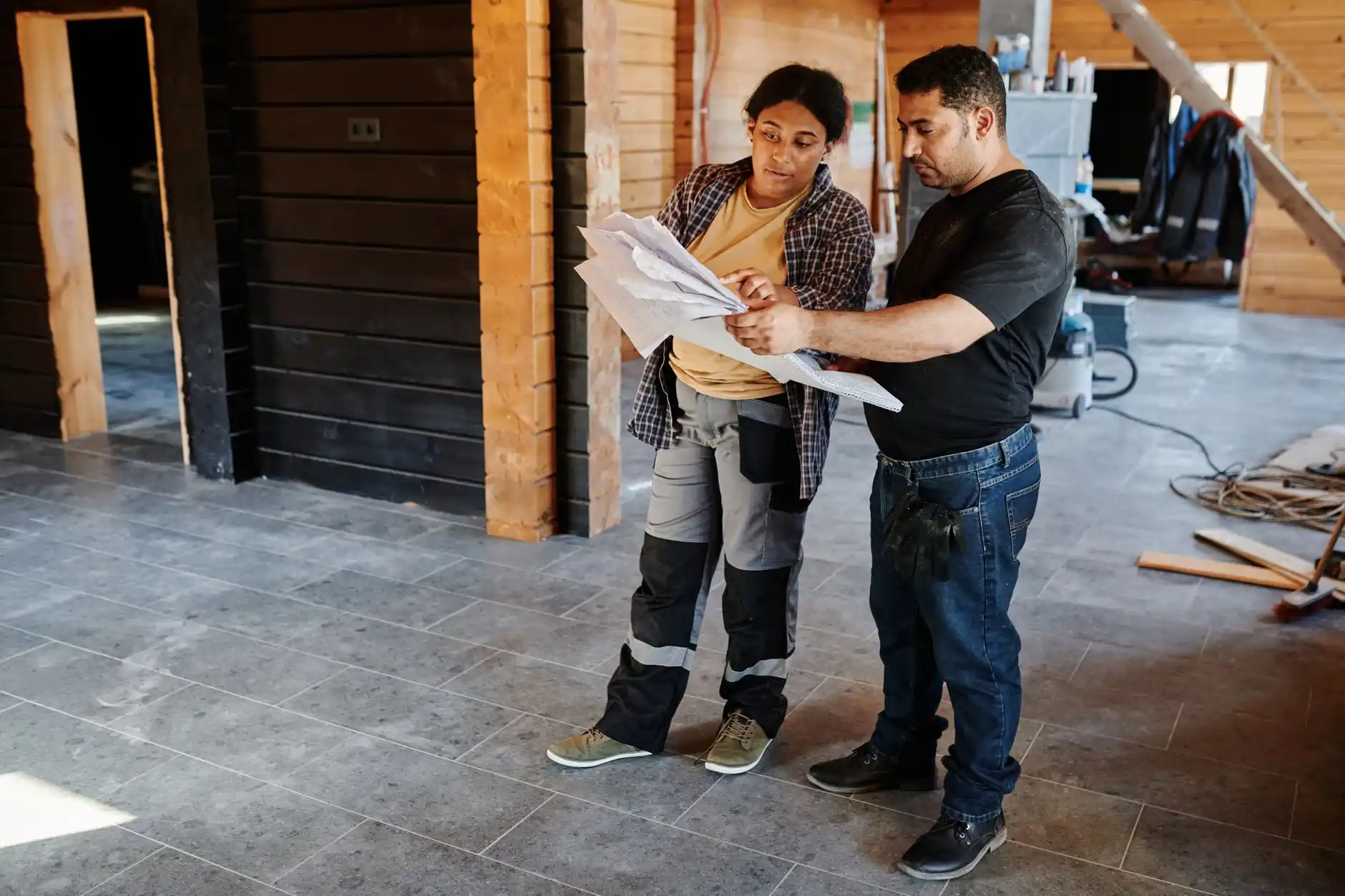 Editorial photograph illustrating "Start With the Construction Permit" in the context of Seattle remodel permits, natural daylight, realistic setting, no text or logos in frame.