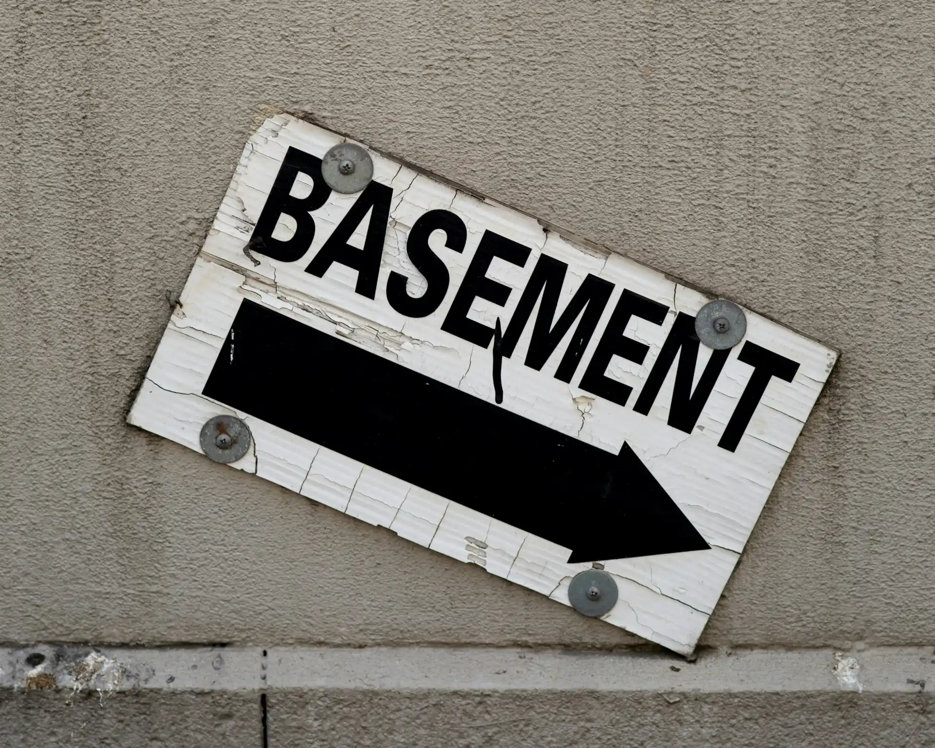 Editorial photograph illustrating "Basement Remodel Permit Checklist" in the context of Seattle remodel permits, natural daylight, realistic setting, no text or logos in frame.