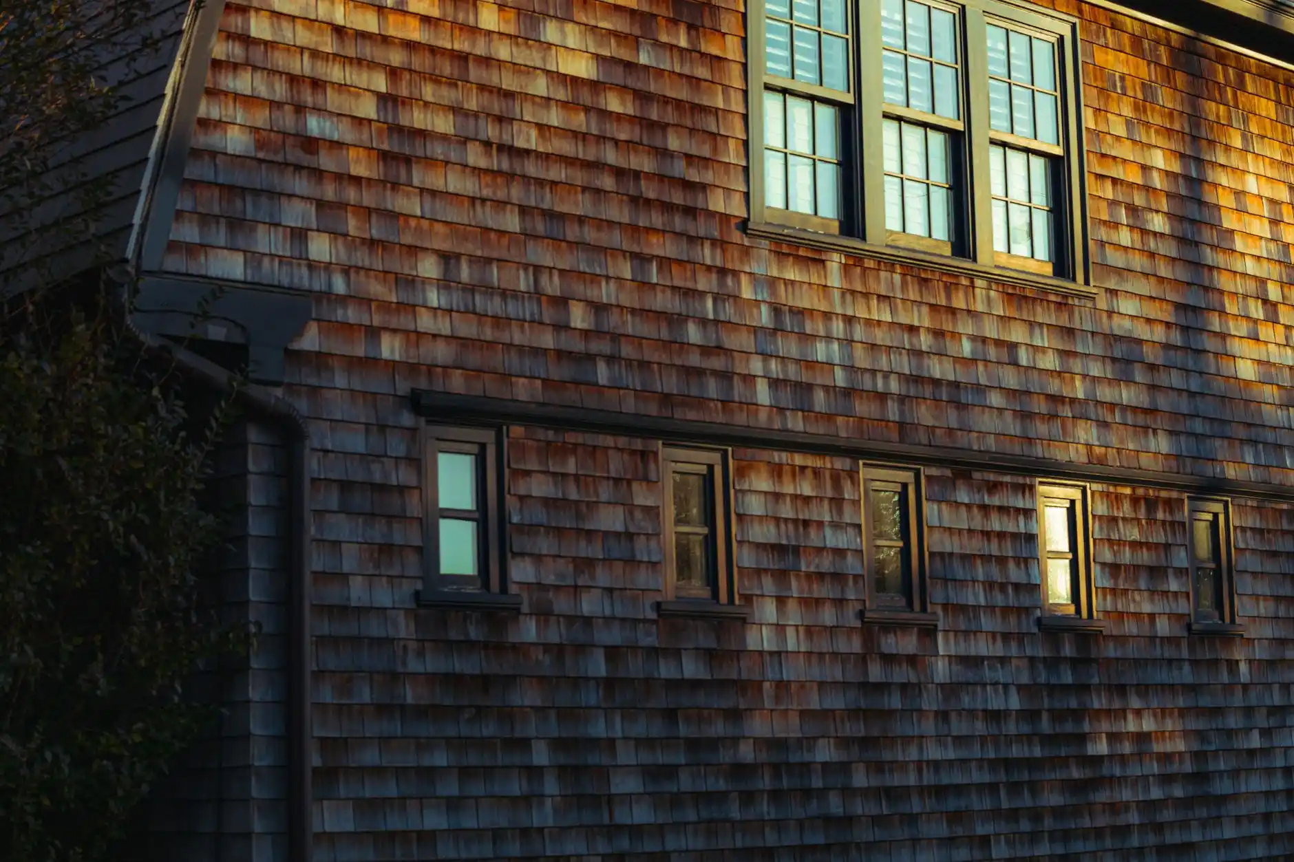 Editorial photograph illustrating "What About Windows" in the context of what to remodel first in an older house, natural daylight, realistic setting, no text or logos in frame.