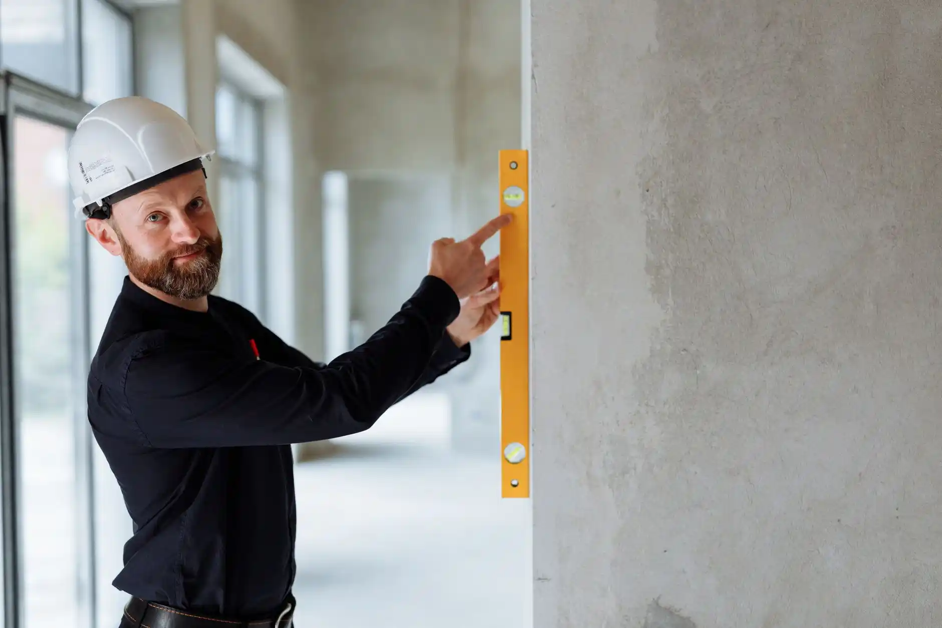 Editorial photograph illustrating "What Does a Structural Engineer Do During a Remodel" in the context of when does a home remodel need a structural engineer, natural daylight, ...