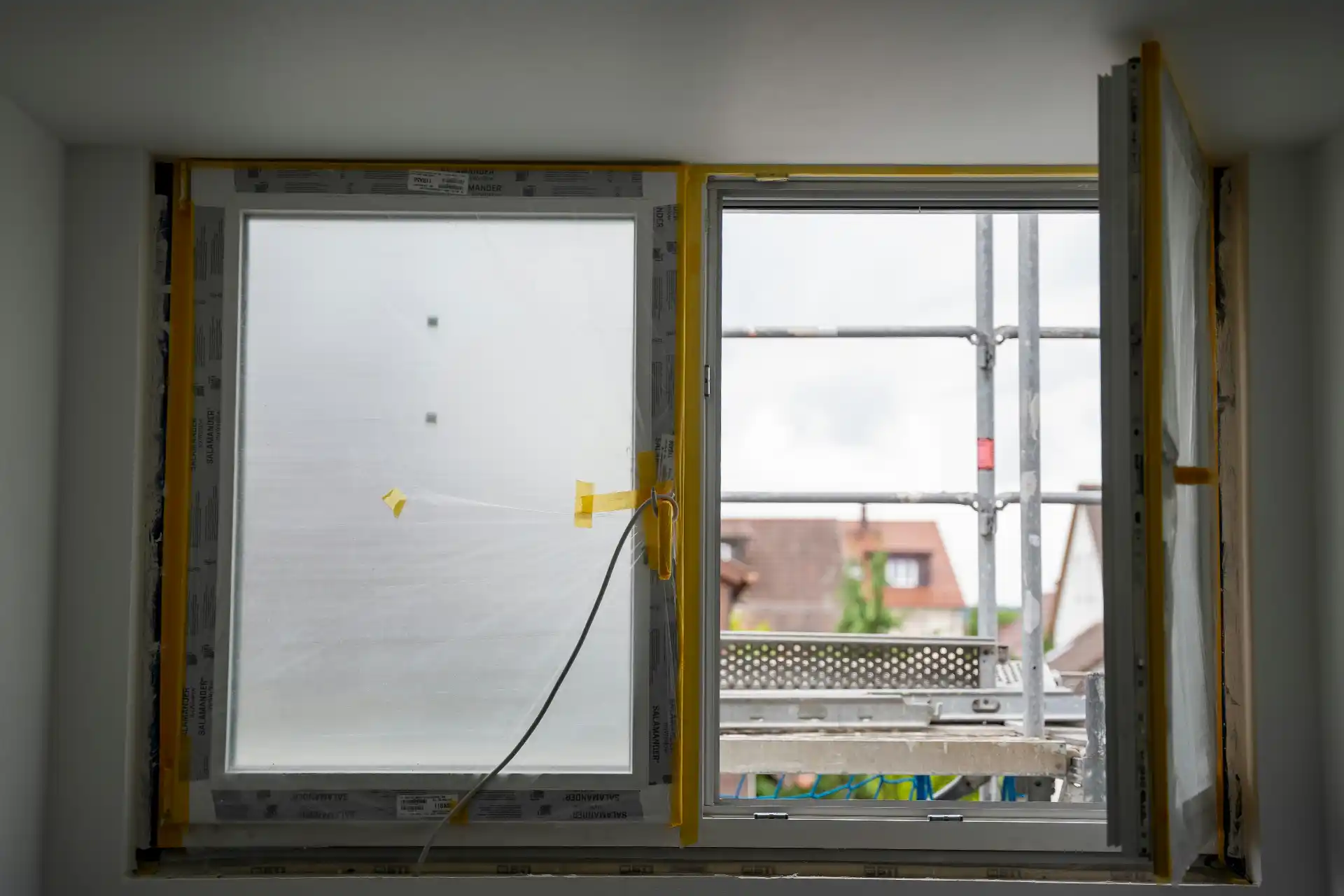 Editorial photograph illustrating "Large Door and Window Openings" in the context of when does a home remodel need a structural engineer, natural daylight, realistic setting, no...