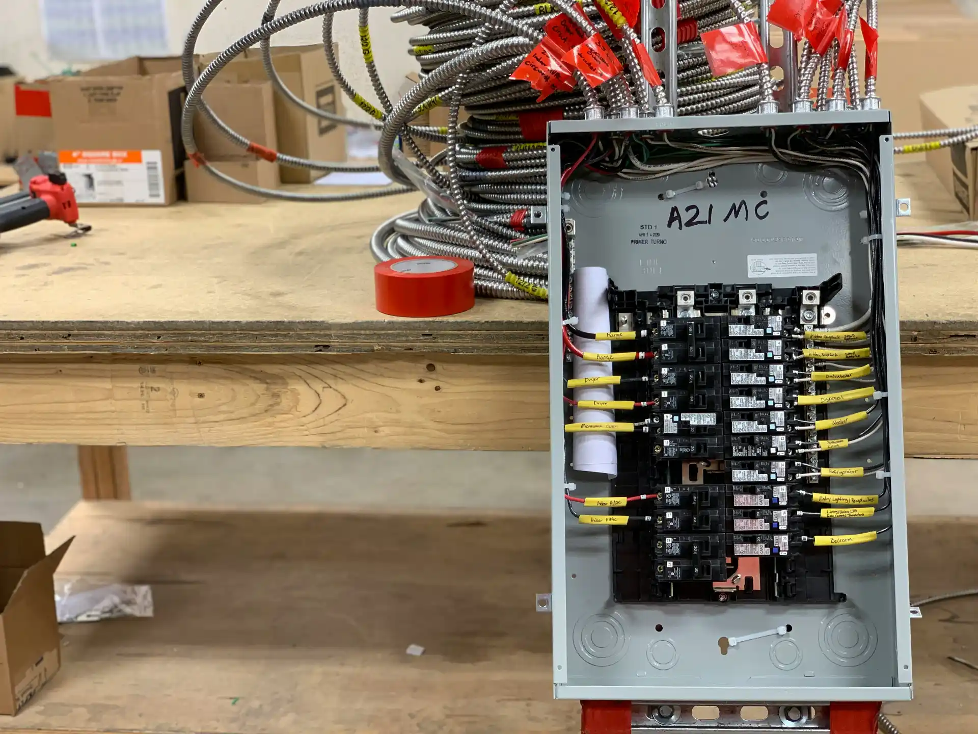 Editorial photograph illustrating "Panel Capacity vs Service Capacity" in the context of electrical panel upgrade during remodel, natural daylight, realistic setting, no text or...