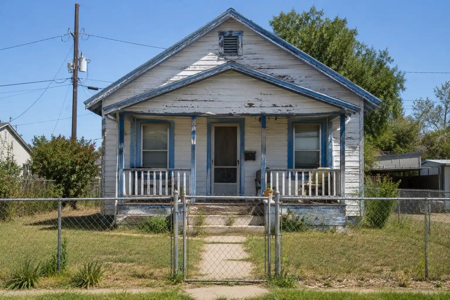Editorial photograph illustrating "Why Asbestos Matters During Remodeling" in the context of lead paint asbestos remodeling older home, natural daylight, realistic setting, no t...