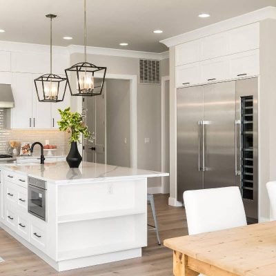 kitchen with island and fridge and dining table