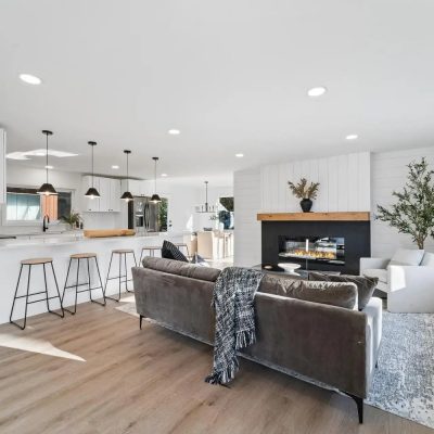 Open-concept living room and kitchen remodel in Seattle by United Signature