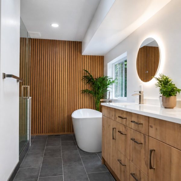 Freestanding tub bathroom remodel with wood slat wall, 2026 United Signature project