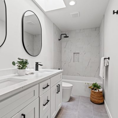 white sinks with black fixtures