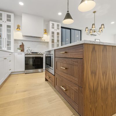 kitchen with wood island and hardwood floors